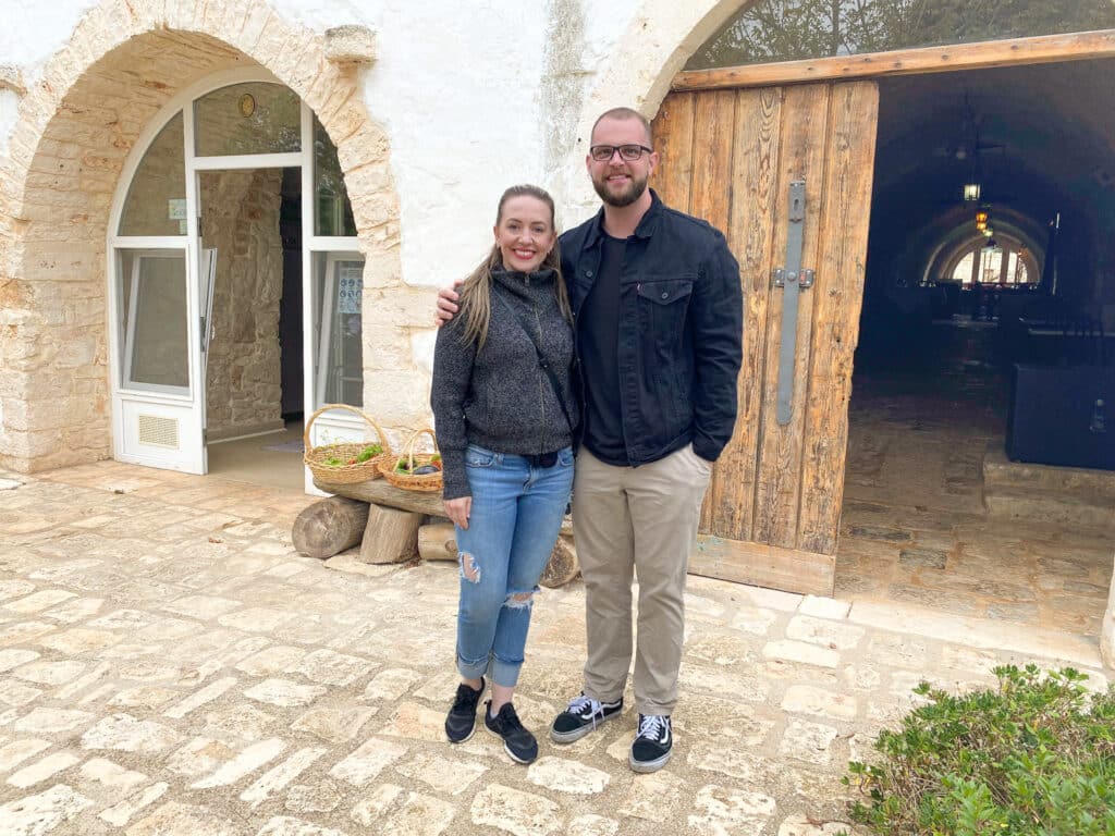 Jillian travel and wellness influencer and blogger and her partner at a cooking class in Alberobello