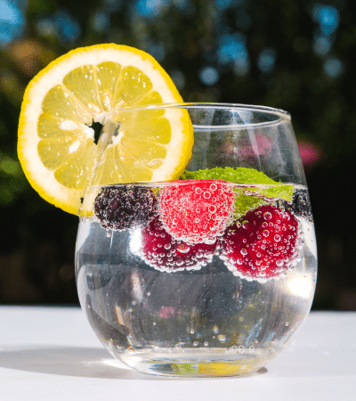 glass of water with fruit 