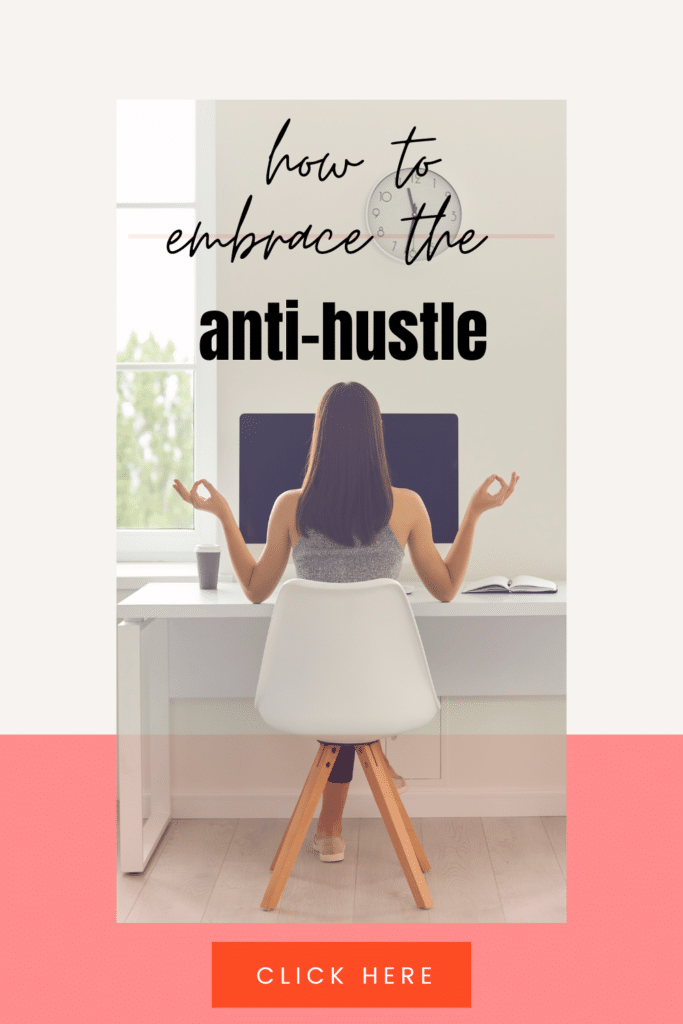 woman sitting at desk embracing anti-hustle culture