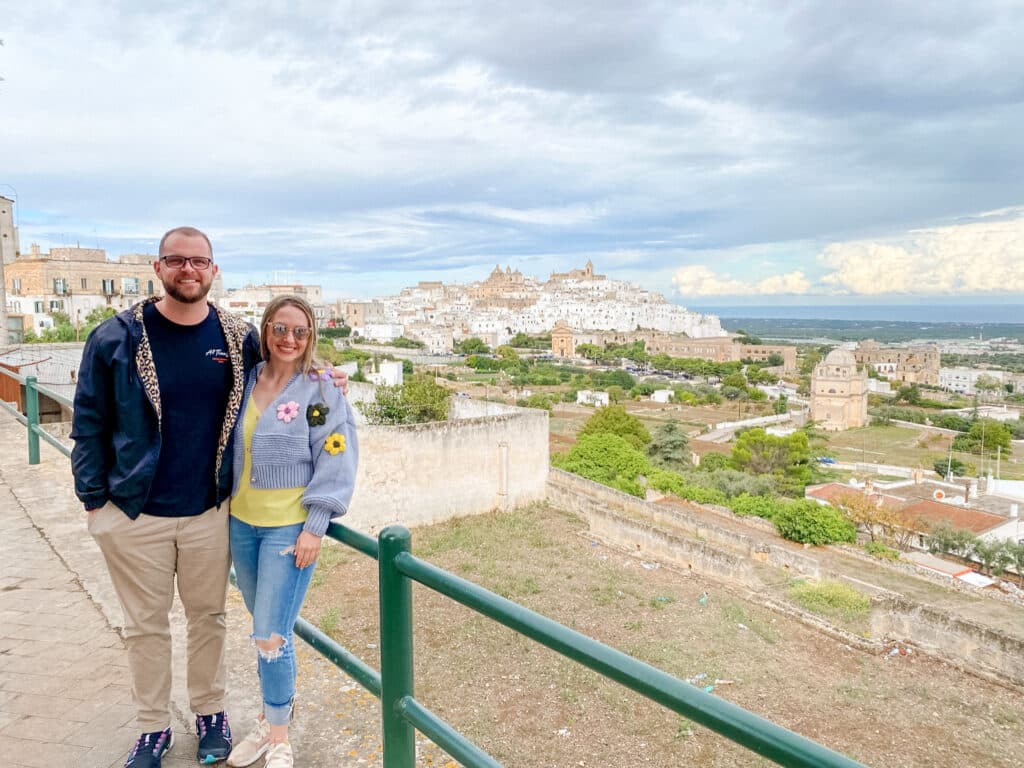 jillian, travel and wellness influencer, with her partner Brandon in Ostuni, Puglia, Italy